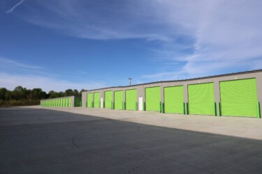 Wide row of drive-up storage units