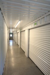 hallway of white indoor climate-controlled storage units